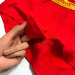 شورت مردانه نیم پا (ترانک) وارداتی جلو باز فلای دار قرمز کش طلایی